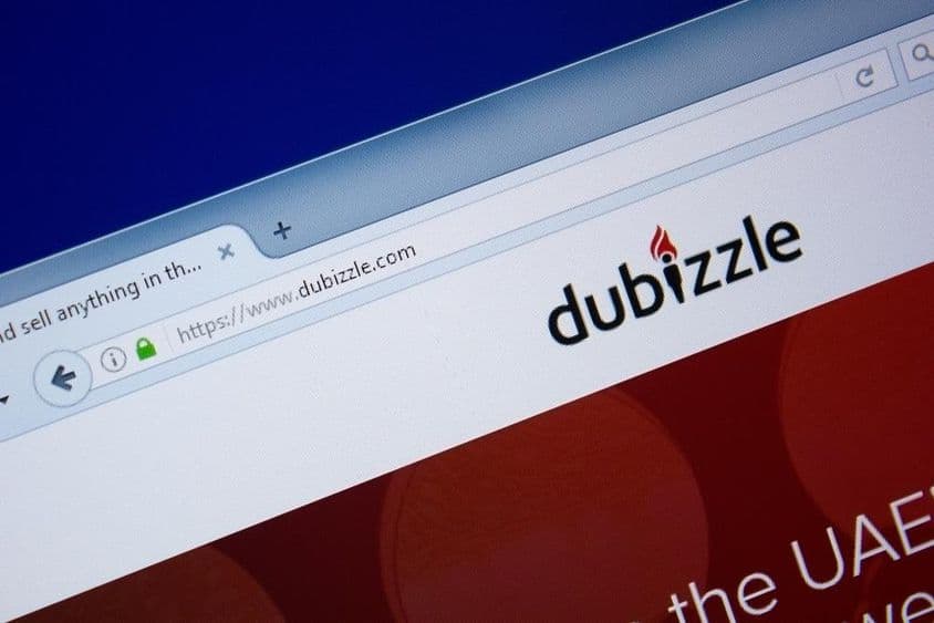 Page d'accueil du site Dubizzle affichée sur un écran d'ordinateur.
