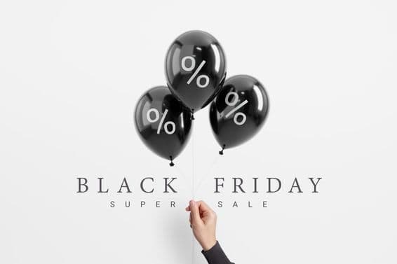 Pourcentage de vente du Black Friday sur ballon noir brillant.