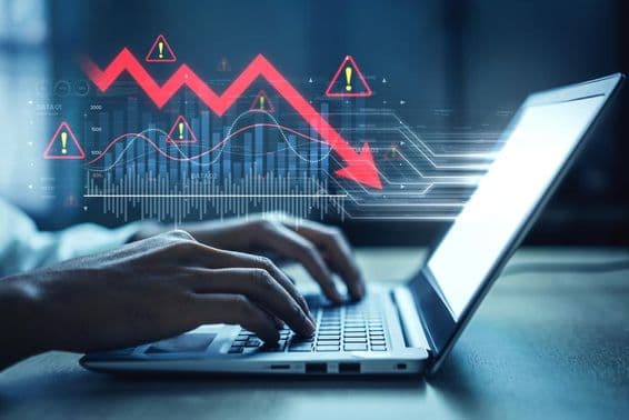 Graphique de marché, symboles d'alerte et tendances de données négatives.